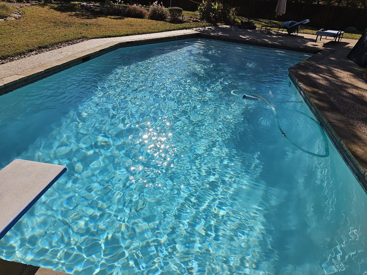 Automated pool control panel and pump setup on a DFW property
